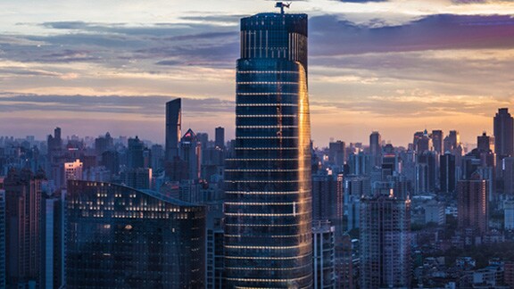 A metropolitan cityscape at sunset